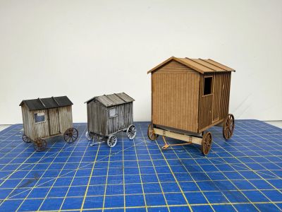Three Shepherds huts, two at 4mm scale and one large one at 7mm scale