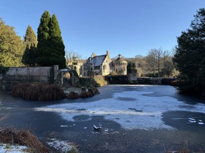 Old Scotney Castle from the North West side with frozen lake.